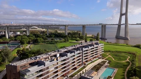 Three keyframes show a modern residential complex with green spaces Video stock 346057565