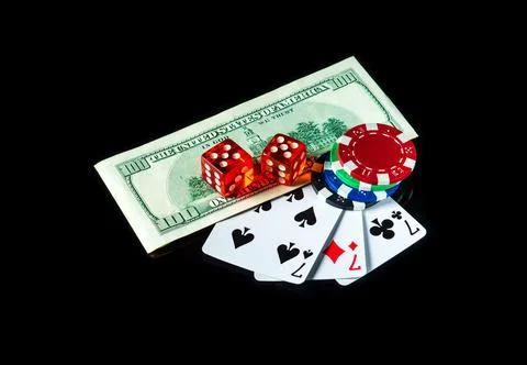 Three of a kind or set cards combination and dollars with chips. Winning Stock Photos