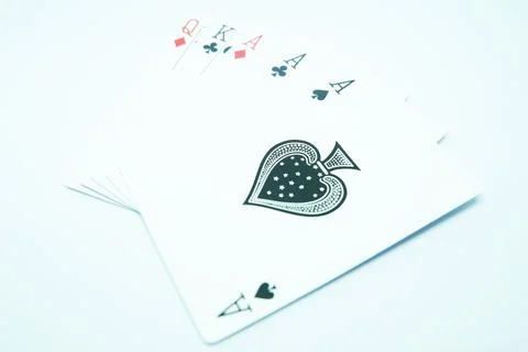 Three of kind, with three of A"s , king and queen in poker game Stock Photos
