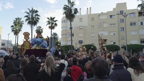 Three Kings Parade Float Surrounded by Crowds in Spain Stock Footage 327510134