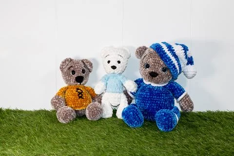 Three knitted bears Stock Photos