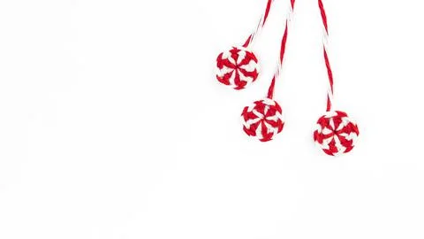 Three knitted red white round candy caramel two pieces on white background Stock Photos