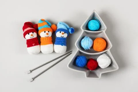 Three knitted snowmen Stock Photos