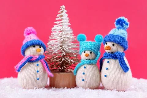 Three knitted snowmen Stock Photos