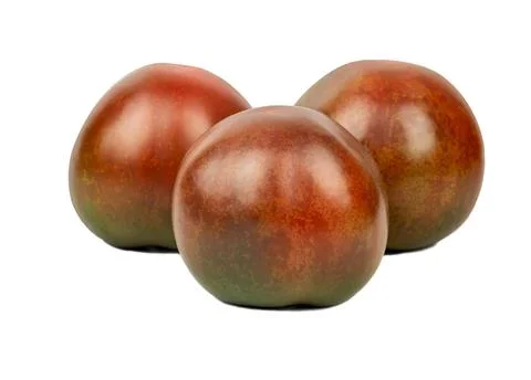 Three kumato tomatoes Stock Photos