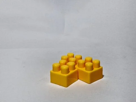 Three L-shaped lego Stock Photos