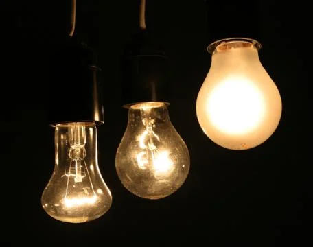 Three lamps on black background Stock Photos