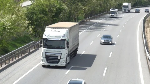 Three-lane highway in two directions of traffic Stock Footage 111089787
