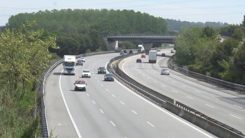 Three-lane highway in two directions of traffic Stock Footage 111089868
