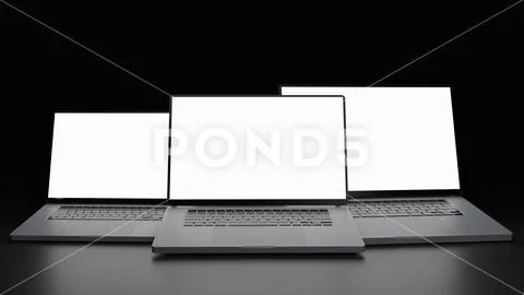 Three laptops in air on black background. Template psd PSD-Vorlage