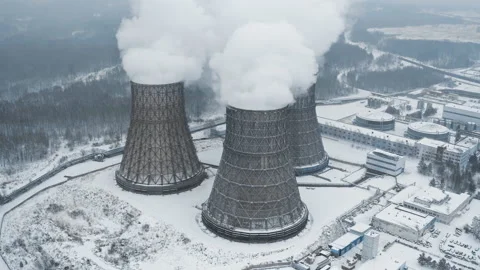 Three large chimneys smoked on territory of electric or heat station in winter Stock Footage 220307844