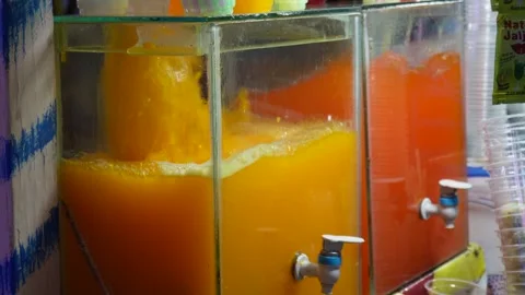 Three large glass containers Vídeo Stock 328517648