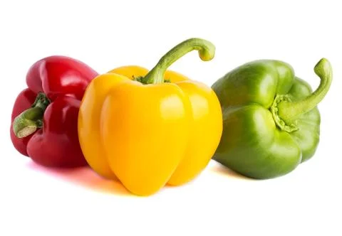 Three large peppers of different colors Stock Photos