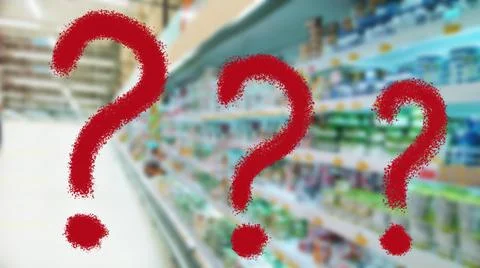 Three large red question mark on abstract blur image of supermarket Stock Photos