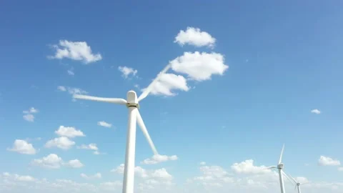 Three Large White Windmills Spinning Stock Footage 137533064