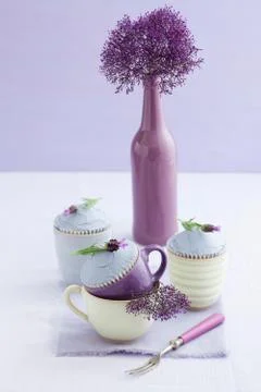 Three lavender cupcakes Stock Photos