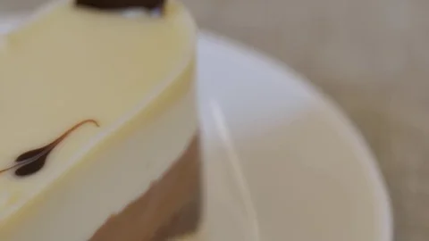 Three layer cake on plate Video stock 76849480