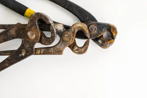 Three Layers of Rusty Pincer Pliers Stock Photos