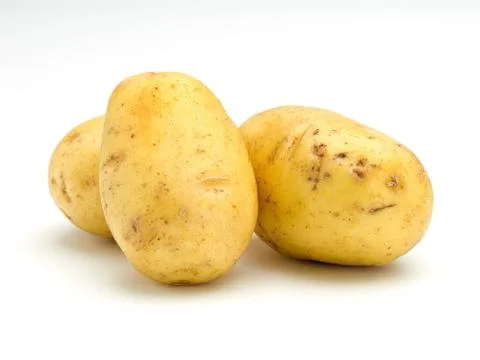 Three Leaning Potatoes Stock Photos