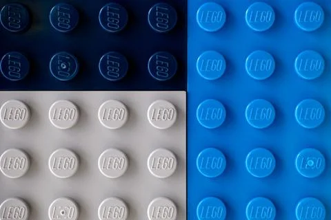 Three Lego baseplates - blue, dark blue, gray Stock Photos