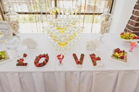 A three-level pyramid of champagne glasses 6709. Stock Photos