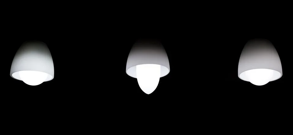 Three light bulbs Stock Photos
