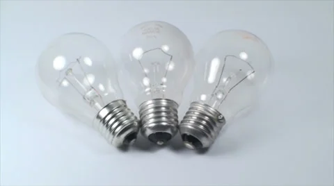 Three Light Bulbs On A White Background, Power, Light, Eco, Friendly, Tilt Stock Footage 39350938