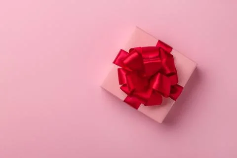 Three light pastel pink boxes tied. Stock Photos