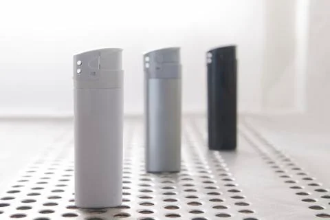Three lighters Stock Photos