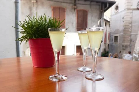 Three limoncello shots Stock Photos