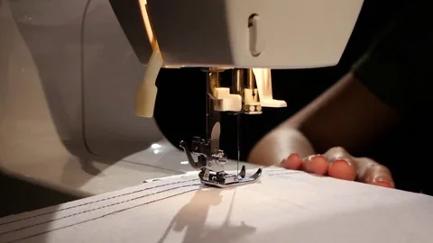 Three lines of black thread on white cloth. Close up Video stock 69255262
