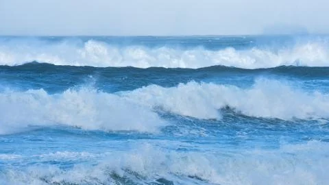 Three lines of waves that reach the coast in rough seas. Galicia Spain. Stock Photos