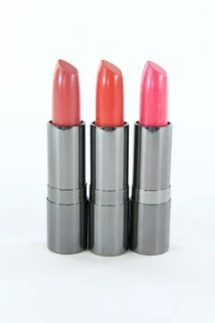 Three lipstick cases in a row Stock Photos
