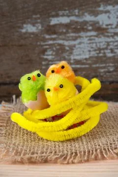 Three little colored chicks easter Stock Photos