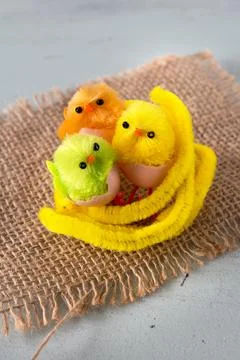 Three little colored chicks easter Stock Photos