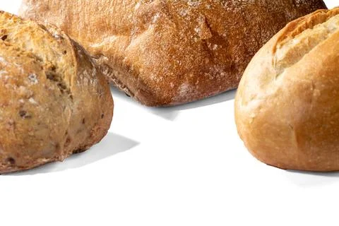 Three loaves of bread on a white background Stock Photos