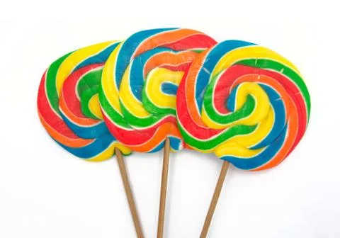 Three lollipops on white background Stock Photos
