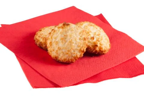 Three macaroons on napkins Stock Photos