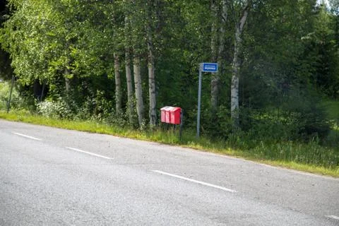 Three mail boxes at a bus stop in Finland Foto stock