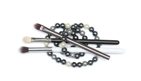 Three MakeUp brushes with beading isolated on white background 스톡 사진