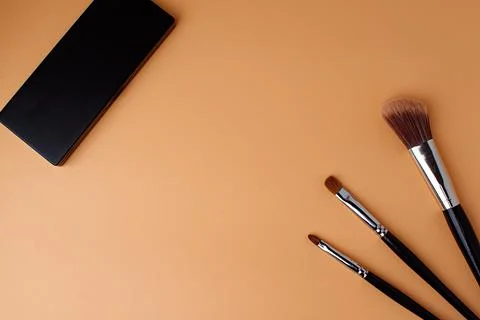Three makeup brushes, brushes for blush, eyeshadow, lipstick and eyeshadow pa Stock Photos