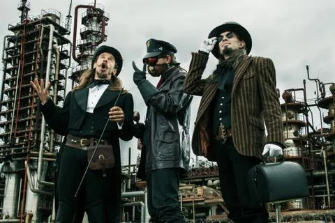 Three mans in steampunk style Stock Photos
