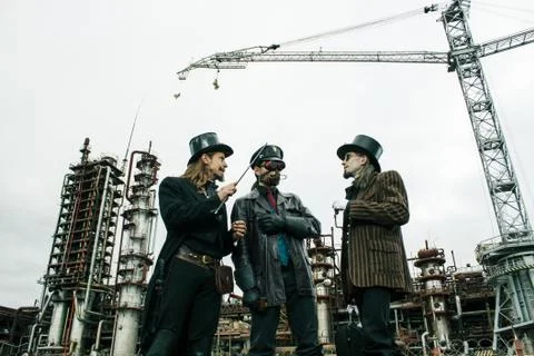 Three mans in steampunk style Stock Photos