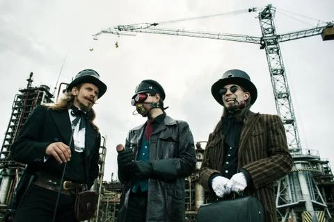 Three mans in steampunk style Stock Photos