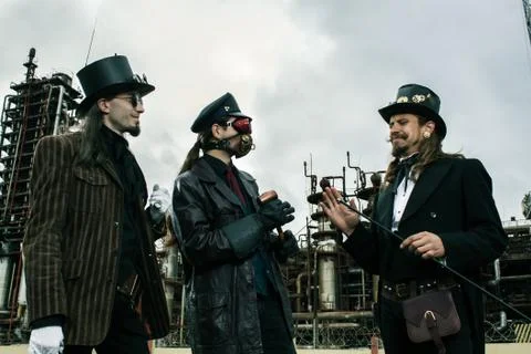 Three mans in steampunk style Stock Photos