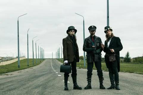 Three mans in steampunk style Stock Photos