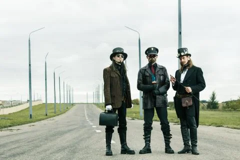 Three mans in steampunk style Stock Photos