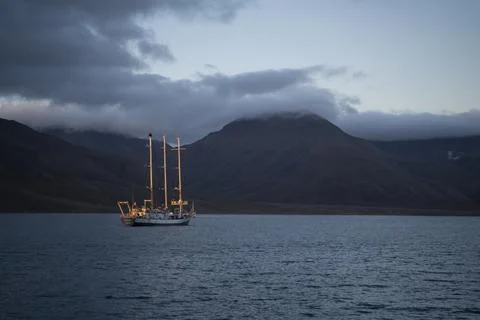 Three masted ship sailing the arctic waters of Svalbard Islands, Norway Stock Photos