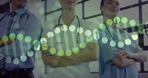 Three medical pros standing in lab with grid-pattern window, showing DNA helix Stock Footage 309285471