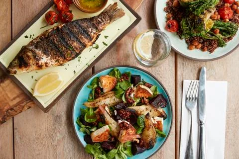 Three Mediterranean and Middle Eastern dishes, overhead view Stock Photos